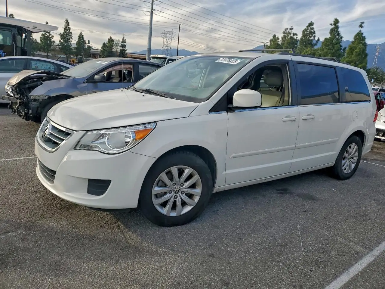 VOLKSWAGEN ROUTAN 2012. Lot# 73975425. VIN 2C4RVABG5CR391715. Photo 1