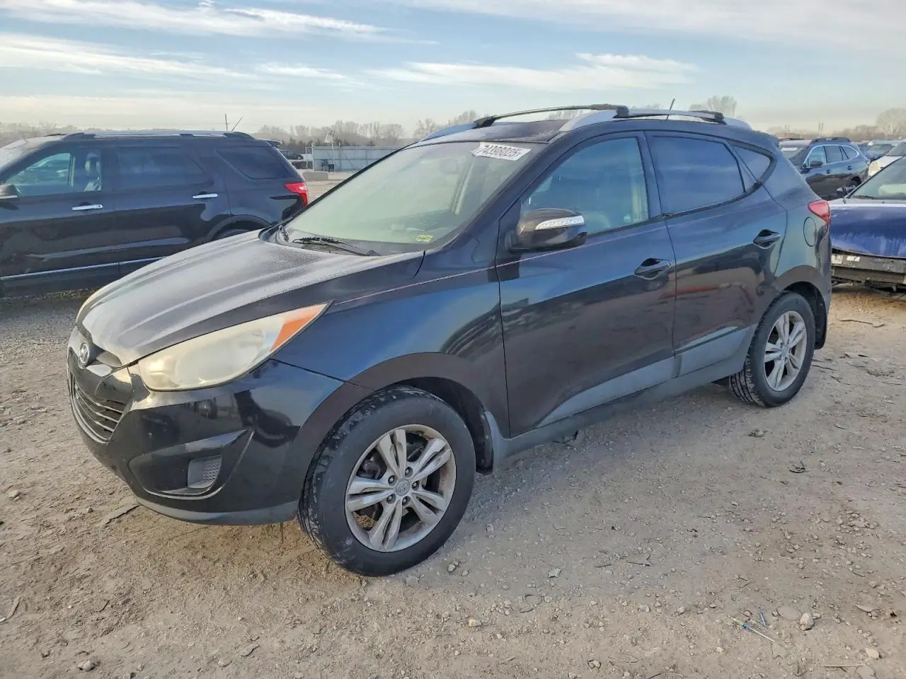 HYUNDAI TUCSON 2012. Lot# 74398025. VIN KM8JU3AC2CU517926. Photo 1