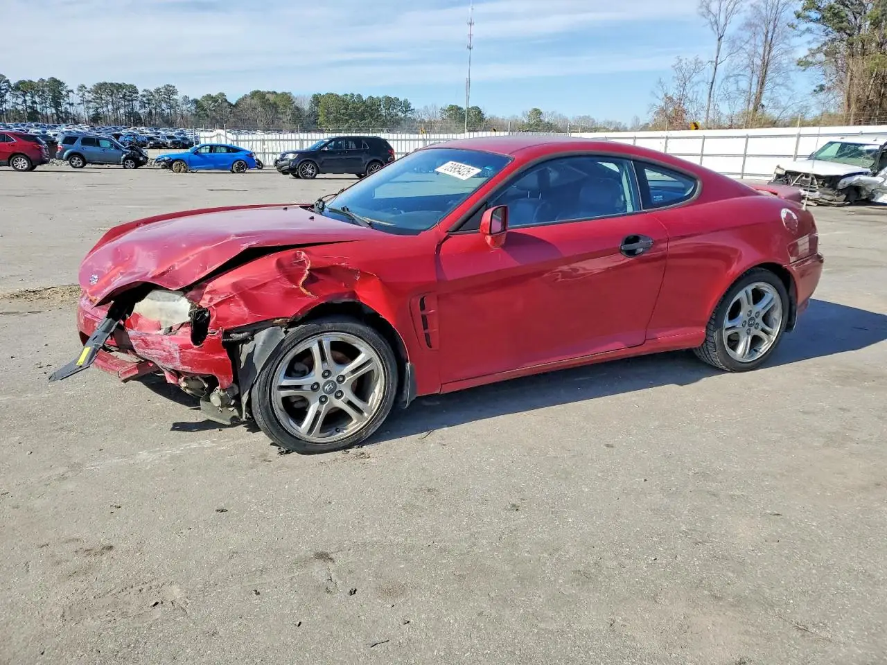 HYUNDAI TIBURON 2006. Lot# 73995425. VIN KMHHN65F56U218288. Photo 1