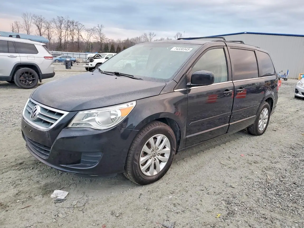 VOLKSWAGEN ROUTAN 2014. Lot# 74330345. VIN 2C4RVABG3ER135091. Photo 1
