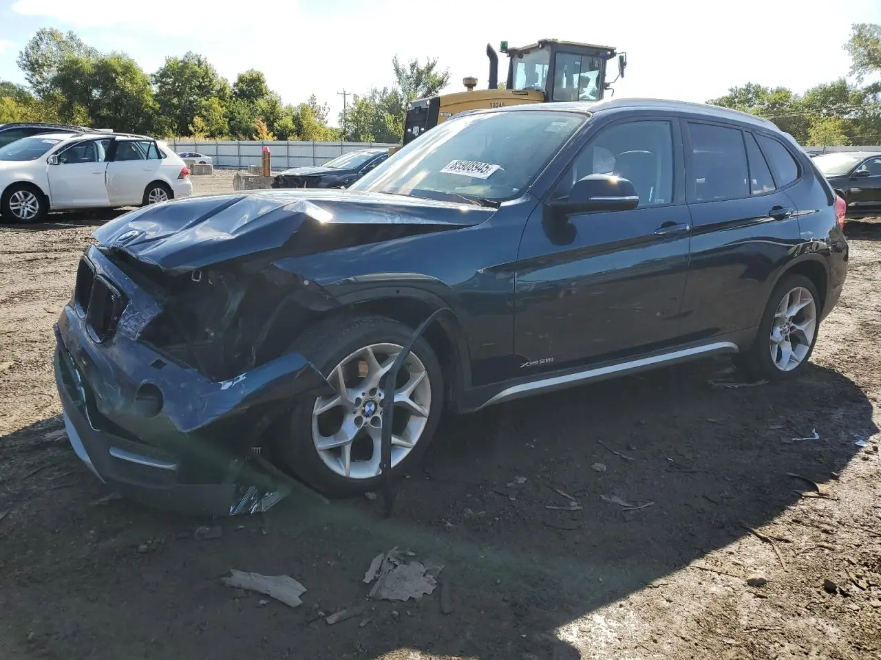 BMW X1 2014. Lot# 85908945. VIN WBAVL1C50EVY14103. Photo 1