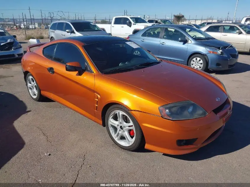 HYUNDAI TIBURON 2006. Lot# 43787759. VIN KMHHN65F96U221775. Photo 1