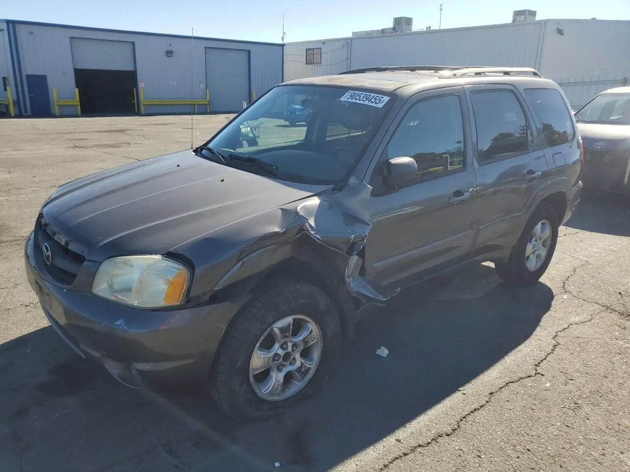MAZDA TRIBUTE 2003. Lot# 90539455. VIN 4F2CZ96143KM13474. Photo 1