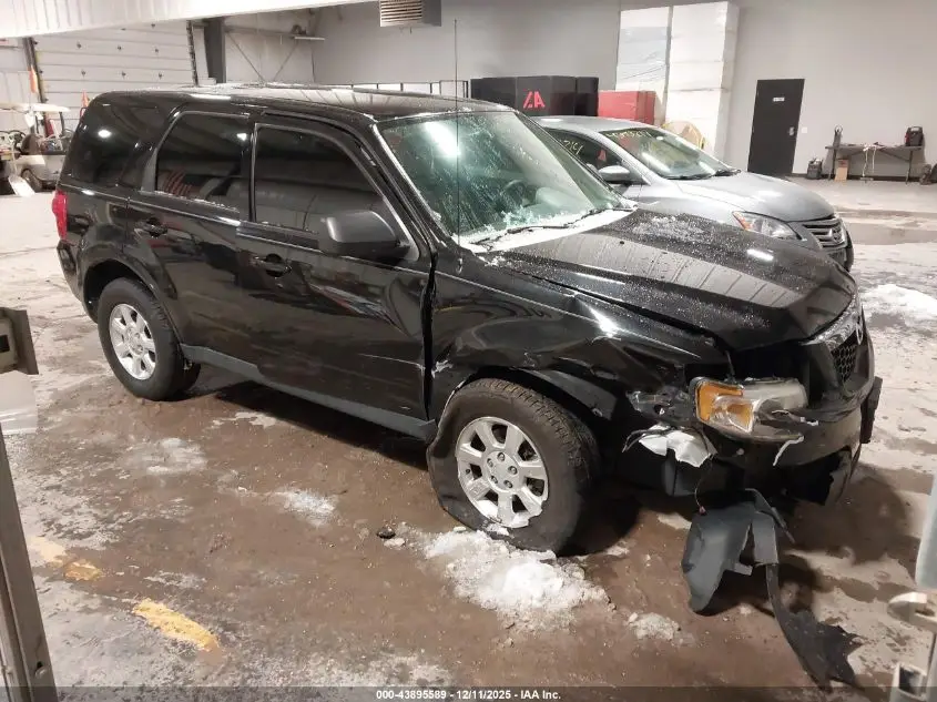 MAZDA TRIBUTE 2011. Lot# 43895589. VIN 4F2CY0C75BKM06748. Photo 1