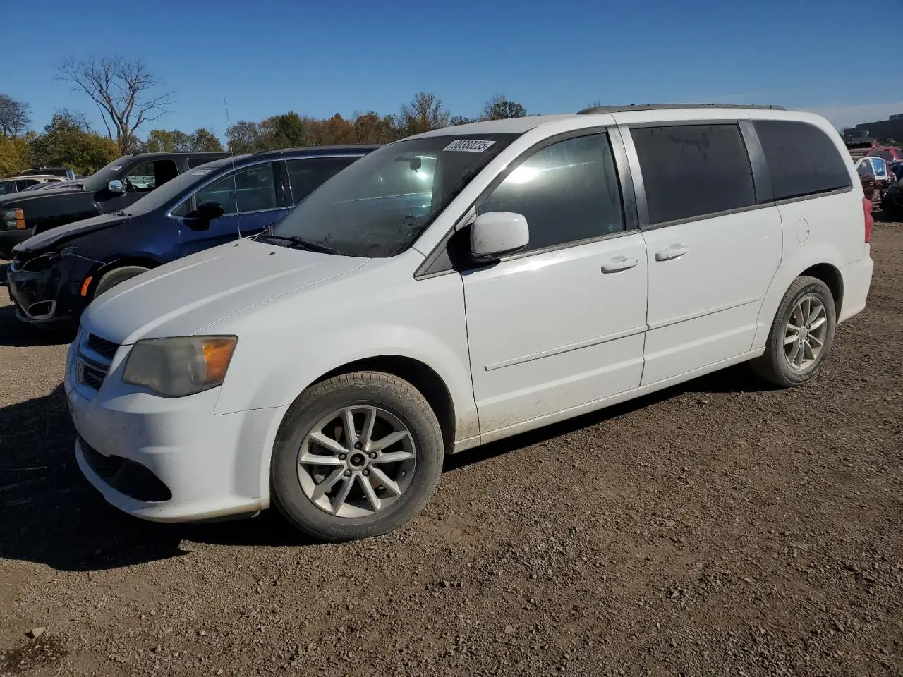 DODGE CARAVAN 2014. Lot# 90380235. VIN 2C4RDGCG1ER477367. Photo 1