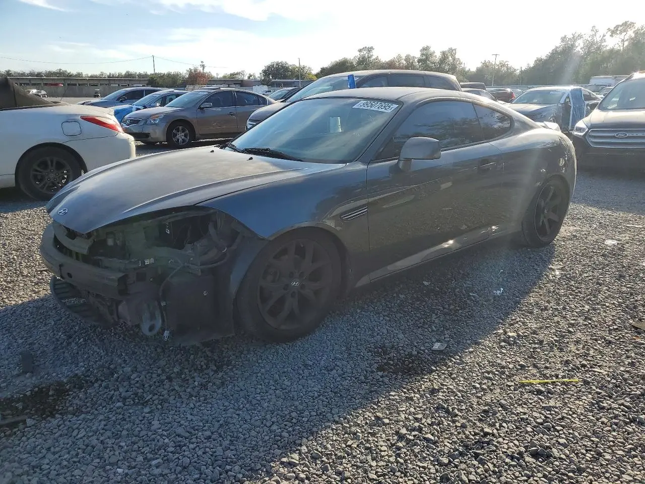 HYUNDAI TIBURON 2007. Lot# 99507695. VIN KMHHM66D57U258775. Photo 1