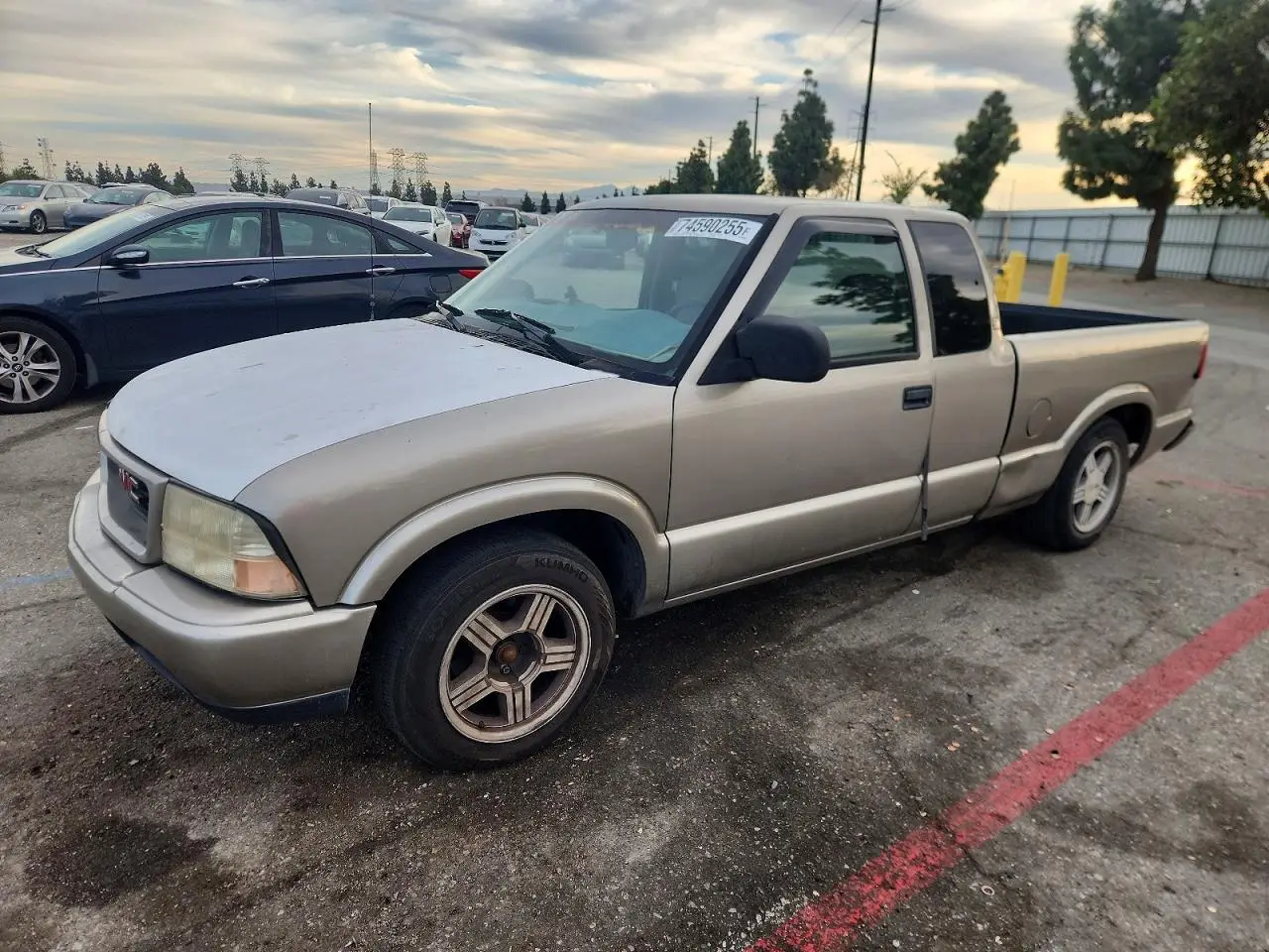 GMC SONOMA 1999. Lot# 74590255. VIN 1GTCS19X3X8501182. Photo 1