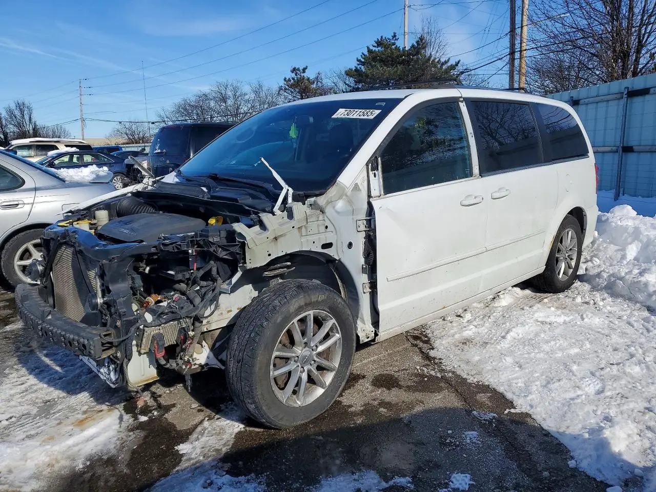DODGE CARAVAN 2014. Lot# 73011585. VIN 2C4RDGCG6ER365700. Photo 1