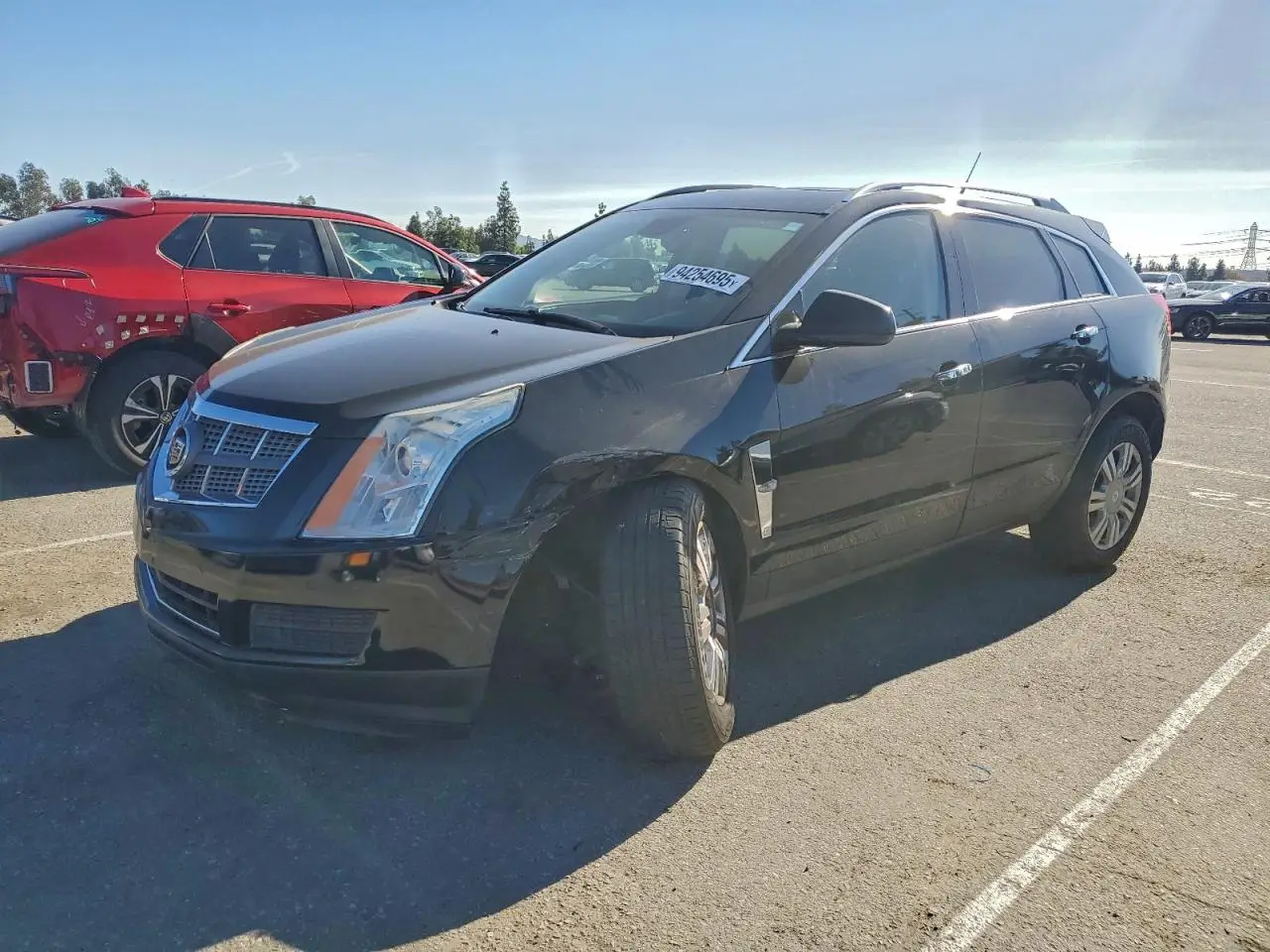 CADILLAC SRX 2011. Lot# 94254695. VIN 3GYFNAEY9BS577129. Photo 1