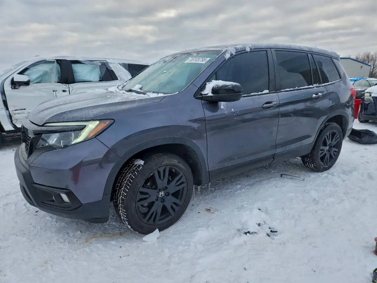 HONDA PASSPORT 2021. Lot# 95185795. VIN 5FNYF8H23MB008008. Photo 1