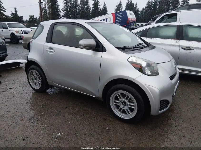 SCION IQ 2014. Lot# 44259117. VIN JTNJJXB02EJ027317. Photo 1