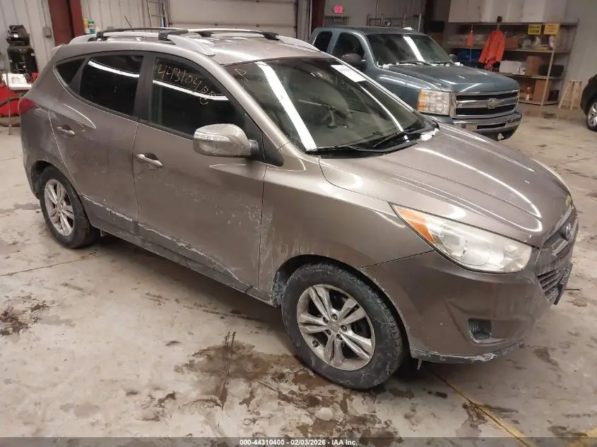 HYUNDAI TUCSON 2012. Lot# 44310400. VIN KM8JUCAC0CU396362. Photo 1