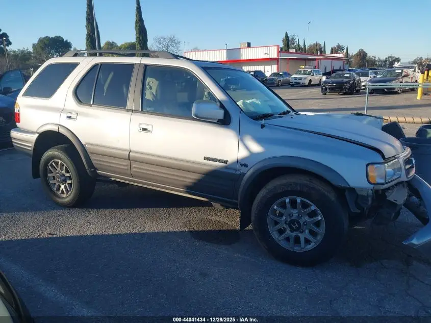 HONDA PASSPORT 2000. Lot# 44041434. VIN 4S6CK58W2Y4411808. Photo 1