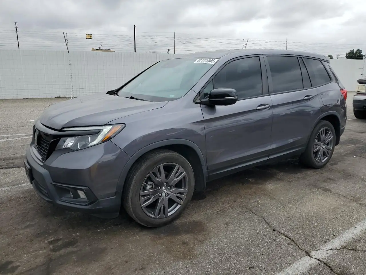 HONDA PASSPORT 2021. Lot# 81885545. VIN 5FNYF7H51MB009937. Photo 1