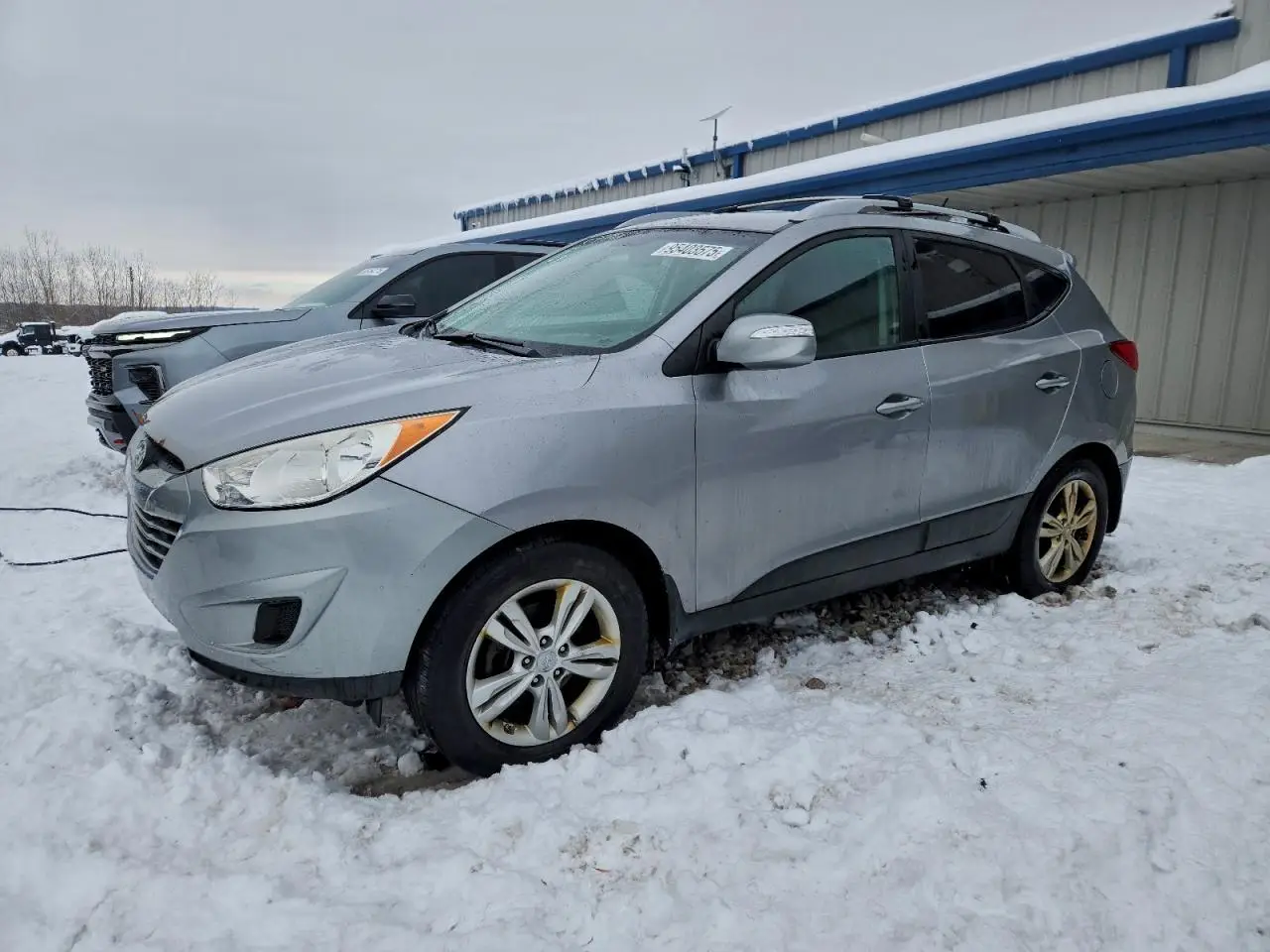 HYUNDAI TUCSON 2012. Lot# 95403575. VIN KM8JUCAC4CU397126. Photo 1