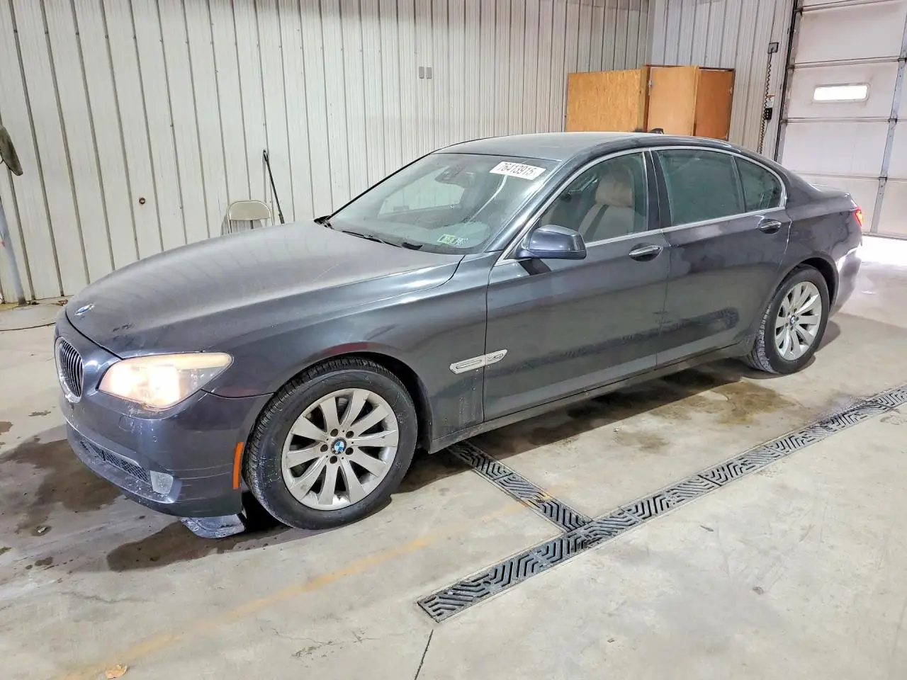 BMW 7 SERIES 2011. Lot# 76413915. VIN WBAKC6C55BC395401. Photo 1