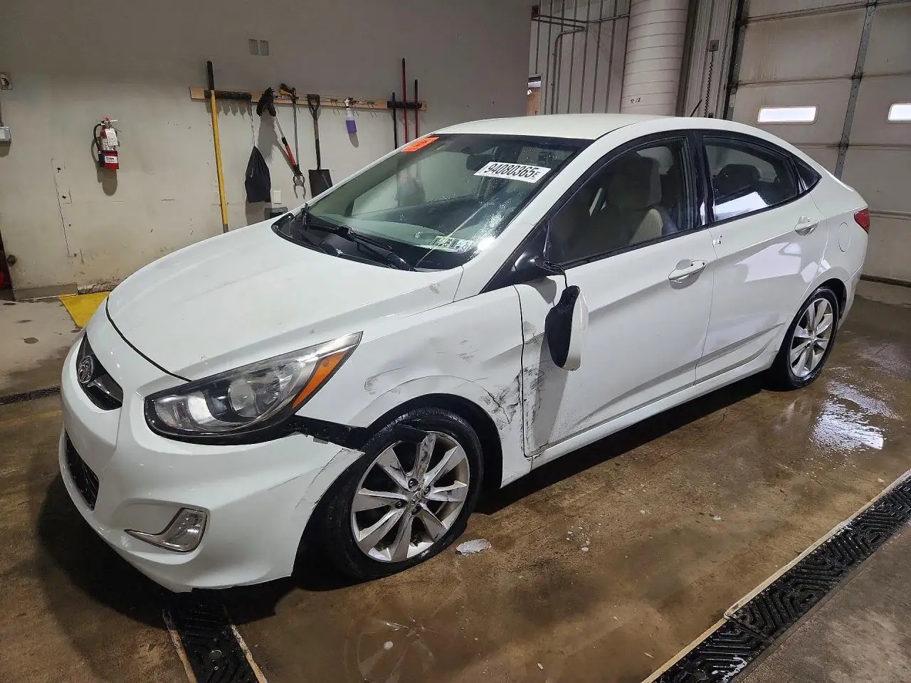 HYUNDAI ACCENT 2013. Lot# 94080365. VIN KMHCU4AE0DU581884. Photo 1