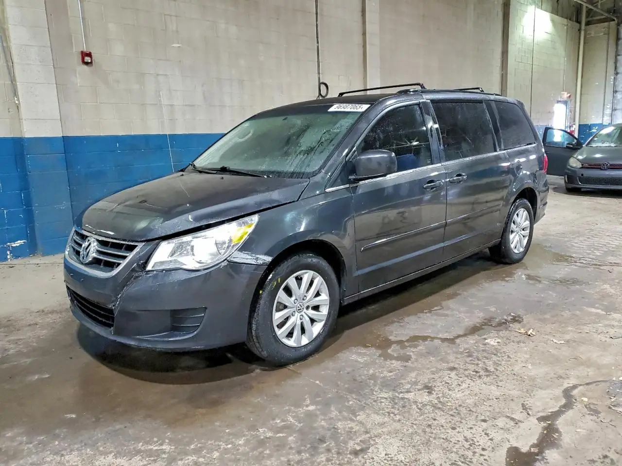 VOLKSWAGEN ROUTAN 2012. Lot# 96987065. VIN 2C4RVABG5CR355149. Photo 1