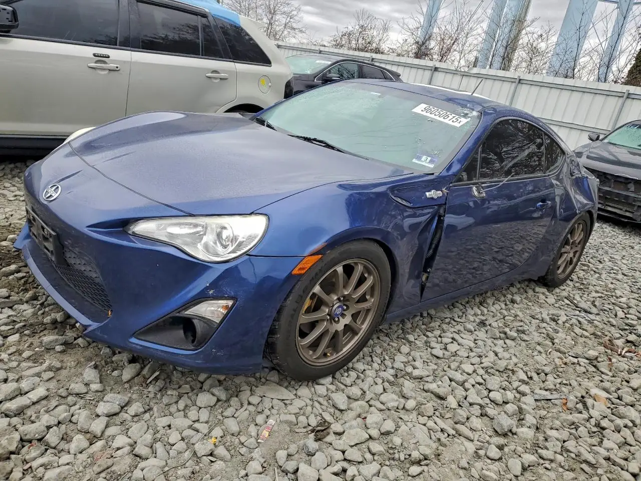 TOYOTA SCION 2013. Lot# 96050615. VIN JF1ZNAA1XD1716853. Photo 1