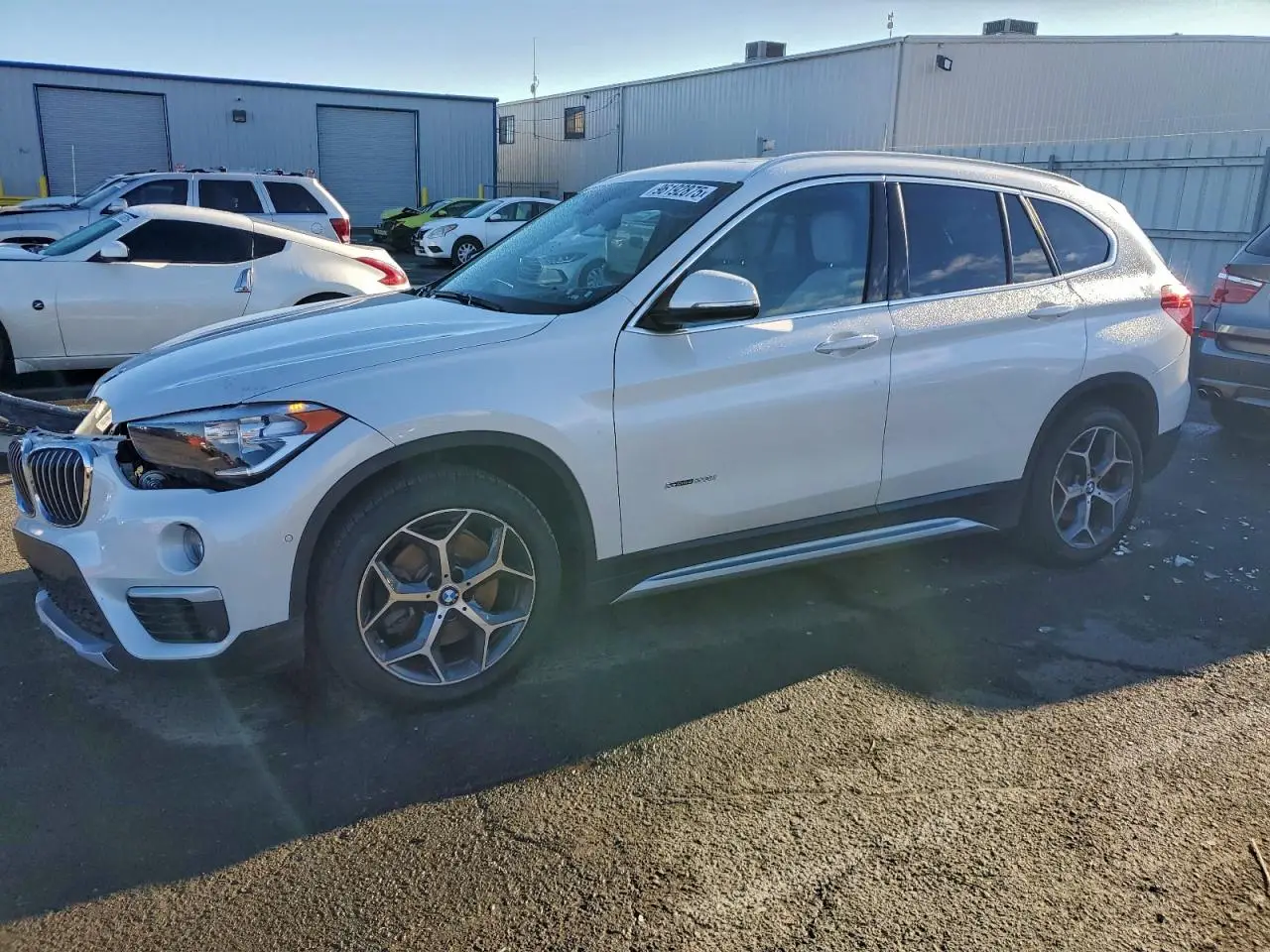 BMW X1 2018. Lot# 96192875. VIN WBXHU7C34J5H45687. Photo 1